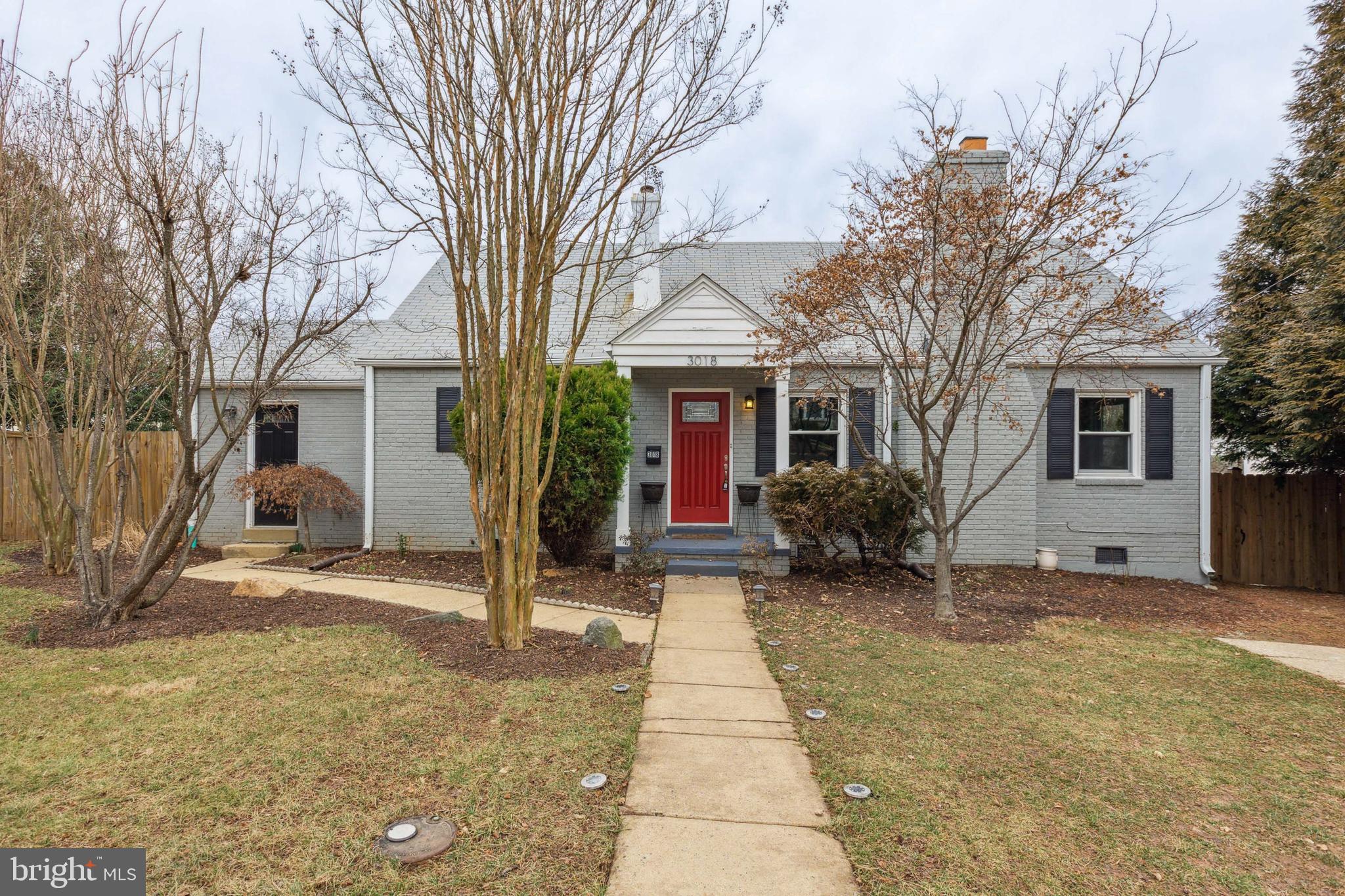 3018 Graham Road Falls Church, VA 22042 - Photo 1 of 36 a view of a house with backyard and tree