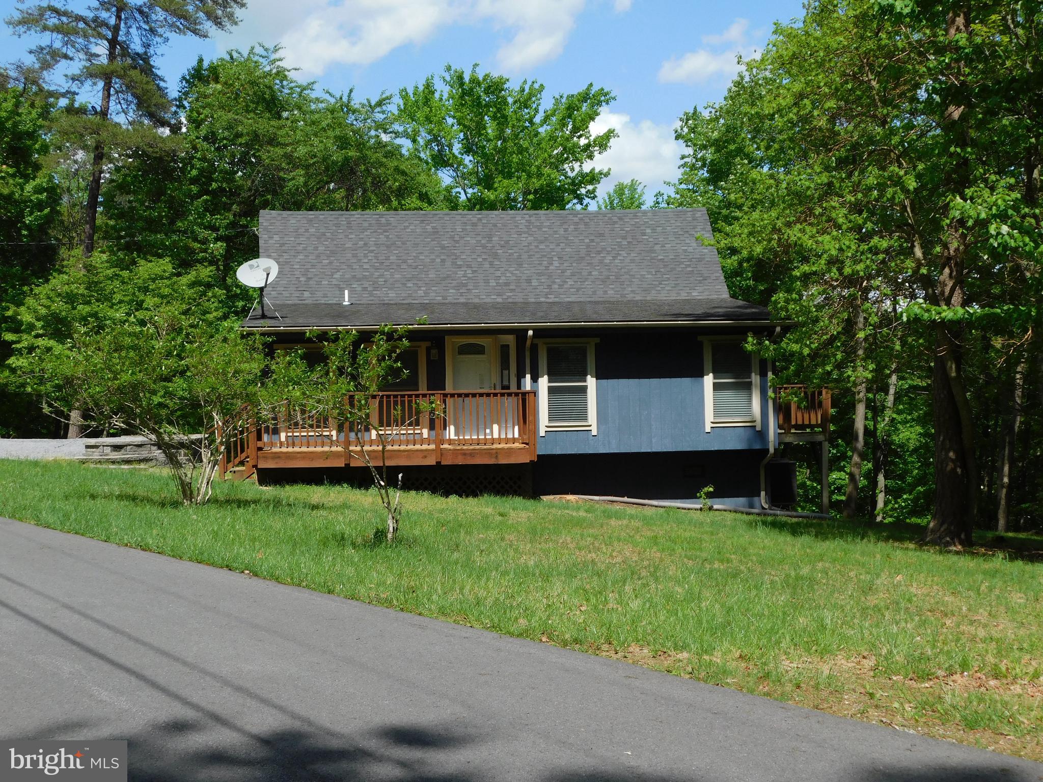 301 Animikean Ridge Hedgesville, WV 25427 - Photo 2 of 51 Exterior with Covered Entry Deck