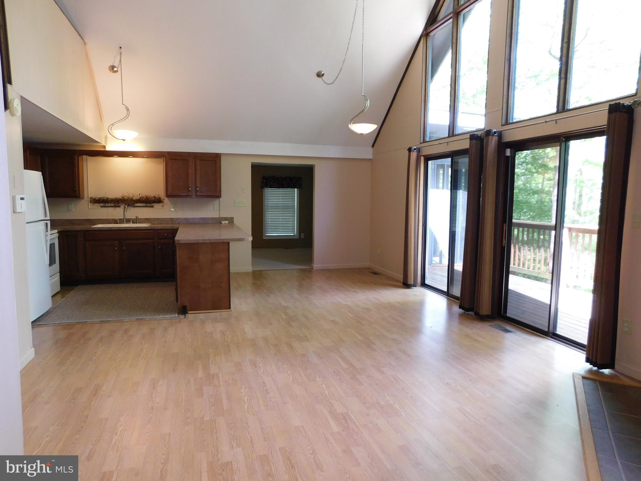 301 Animikean Ridge Hedgesville, WV 25427 - Photo 51 of 51 Open floor plan with cathedral ceilings