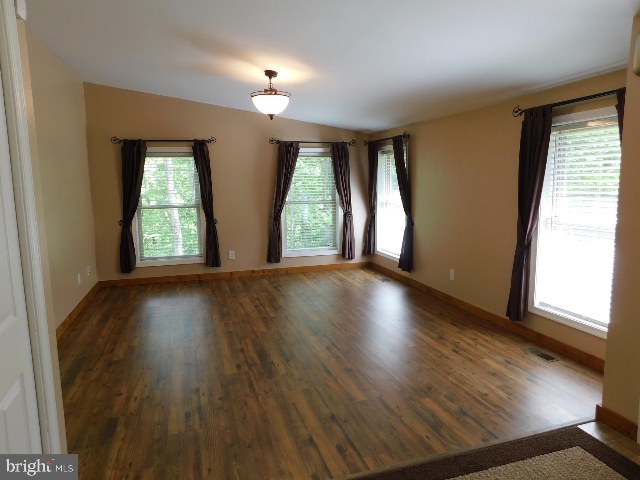 301 Animikean Ridge Hedgesville, WV 25427 - Photo 11 of 51 Dining room or den with lots of light