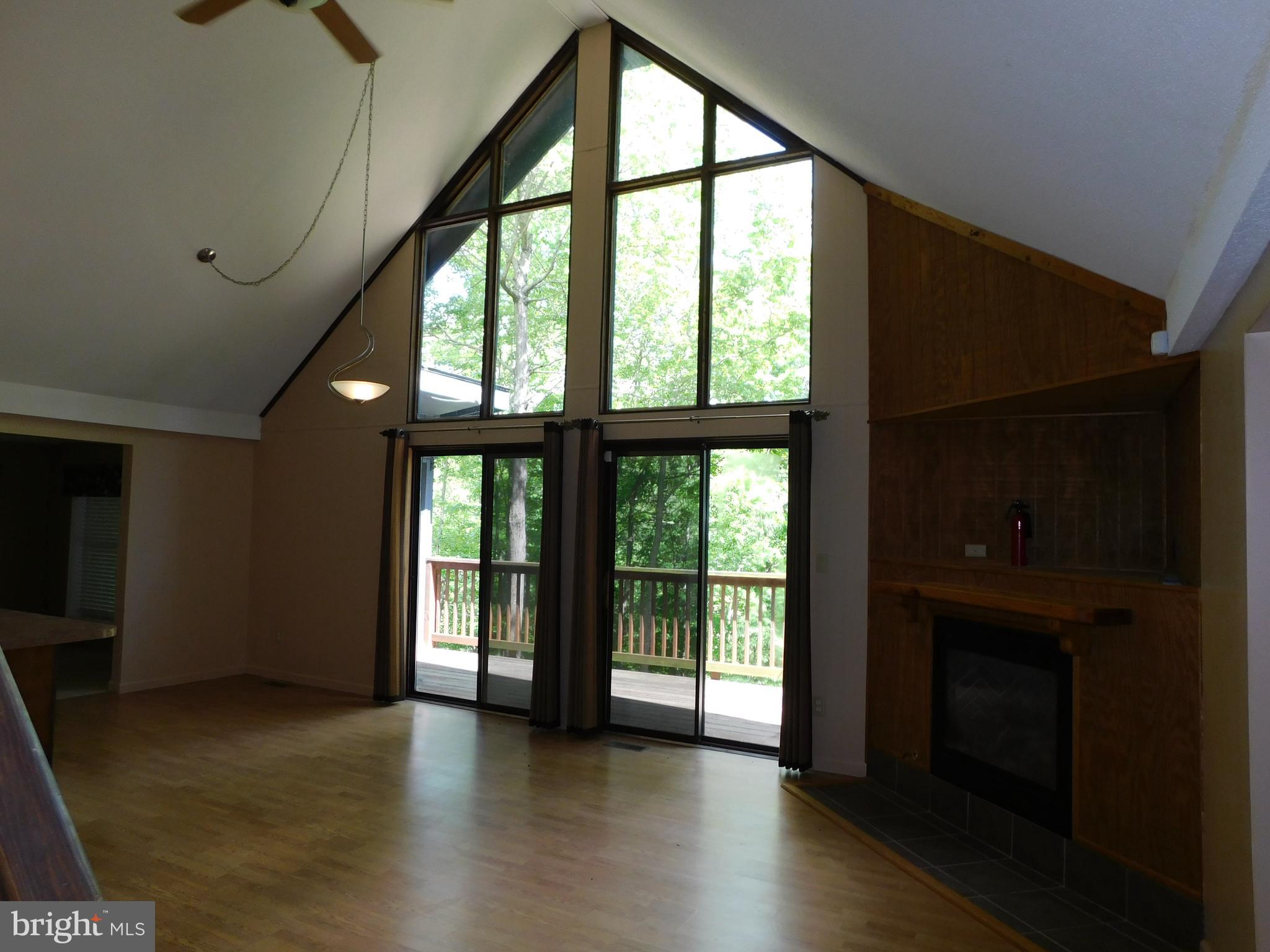 301 Animikean Ridge Hedgesville, WV 25427 - Photo 15 of 51 Great room with access to the large deck