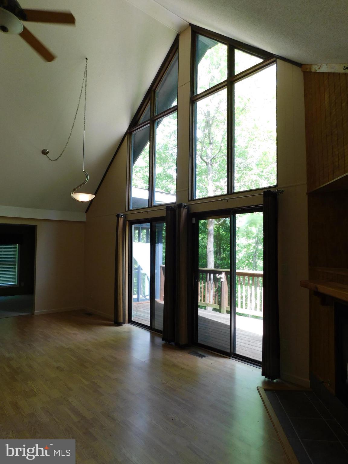 301 Animikean Ridge Hedgesville, WV 25427 - Photo 17 of 51 Window wall of glass in the great room