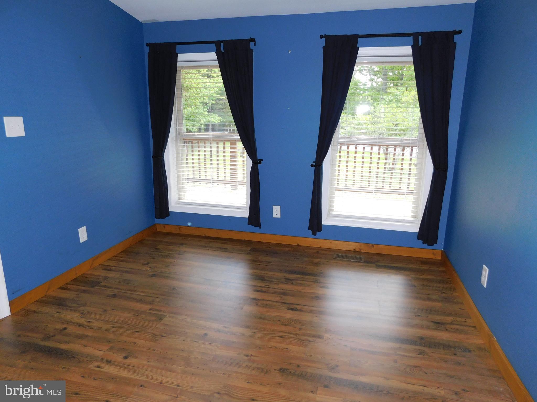 301 Animikean Ridge Hedgesville, WV 25427 - Photo 34 of 51 Bright and airy guest bedroom