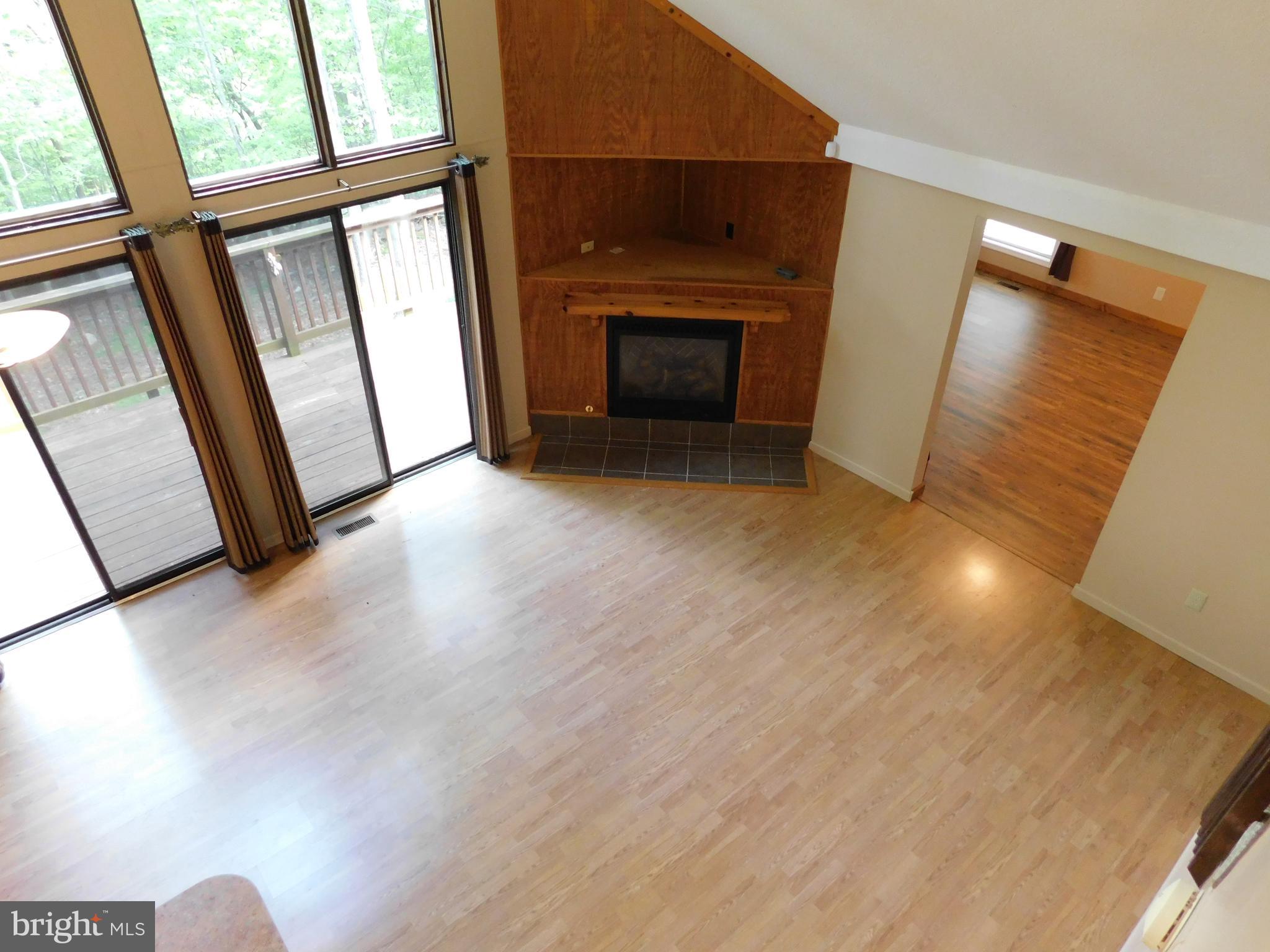 301 Animikean Ridge Hedgesville, WV 25427 - Photo 39 of 51 Gas fireplace in the great room