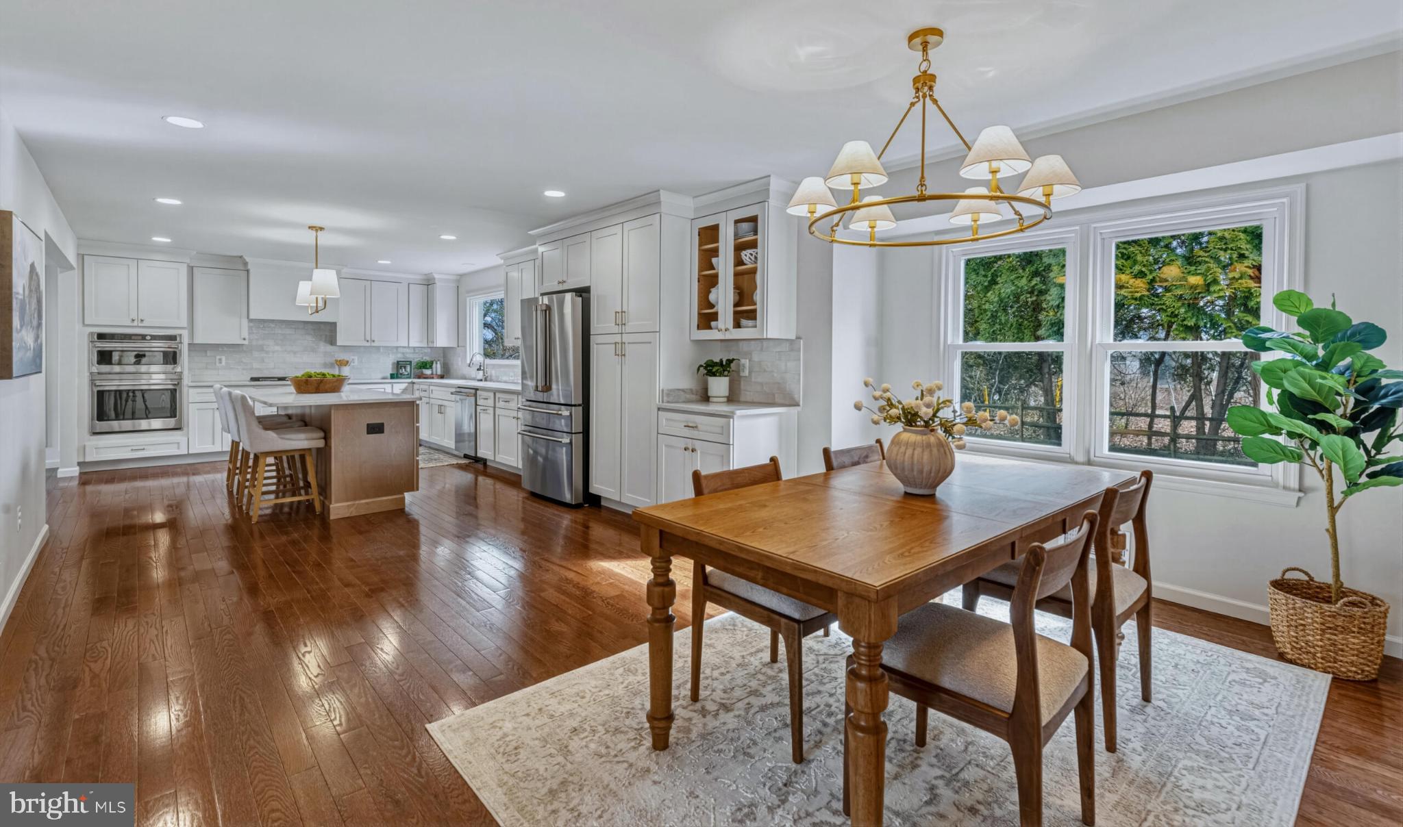 1331 Deep Run Lane Reston, VA 20190 - Photo 13 of 51 a view of a dining room with furniture window and wooden floor