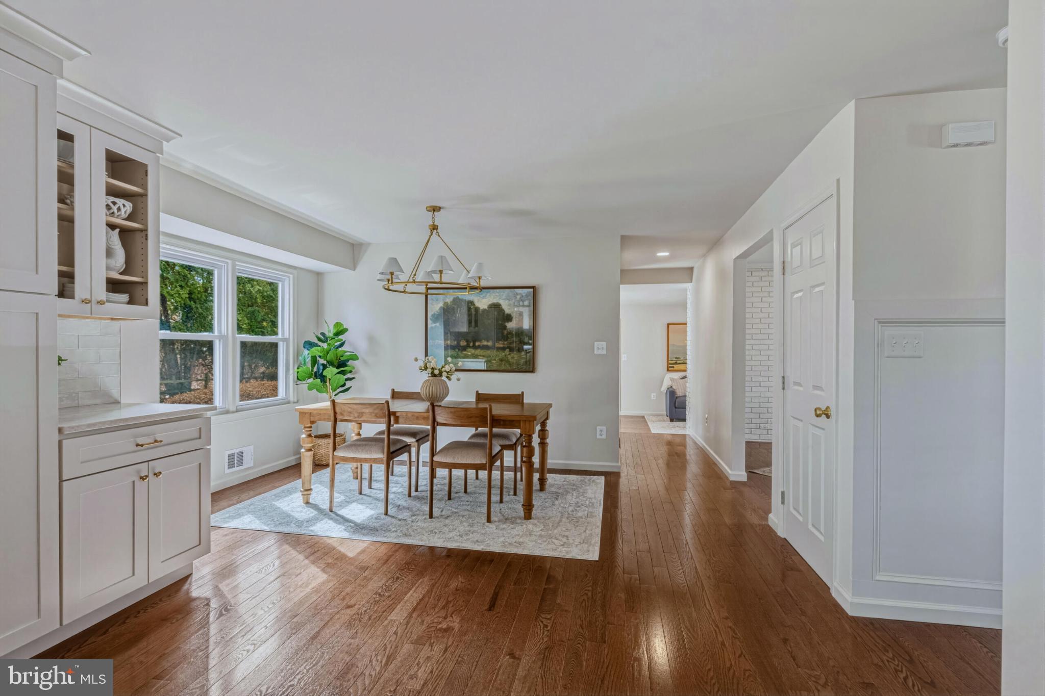 1331 Deep Run Lane Reston, VA 20190 - Photo 14 of 51 a view of a dining room with furniture and wooden floor