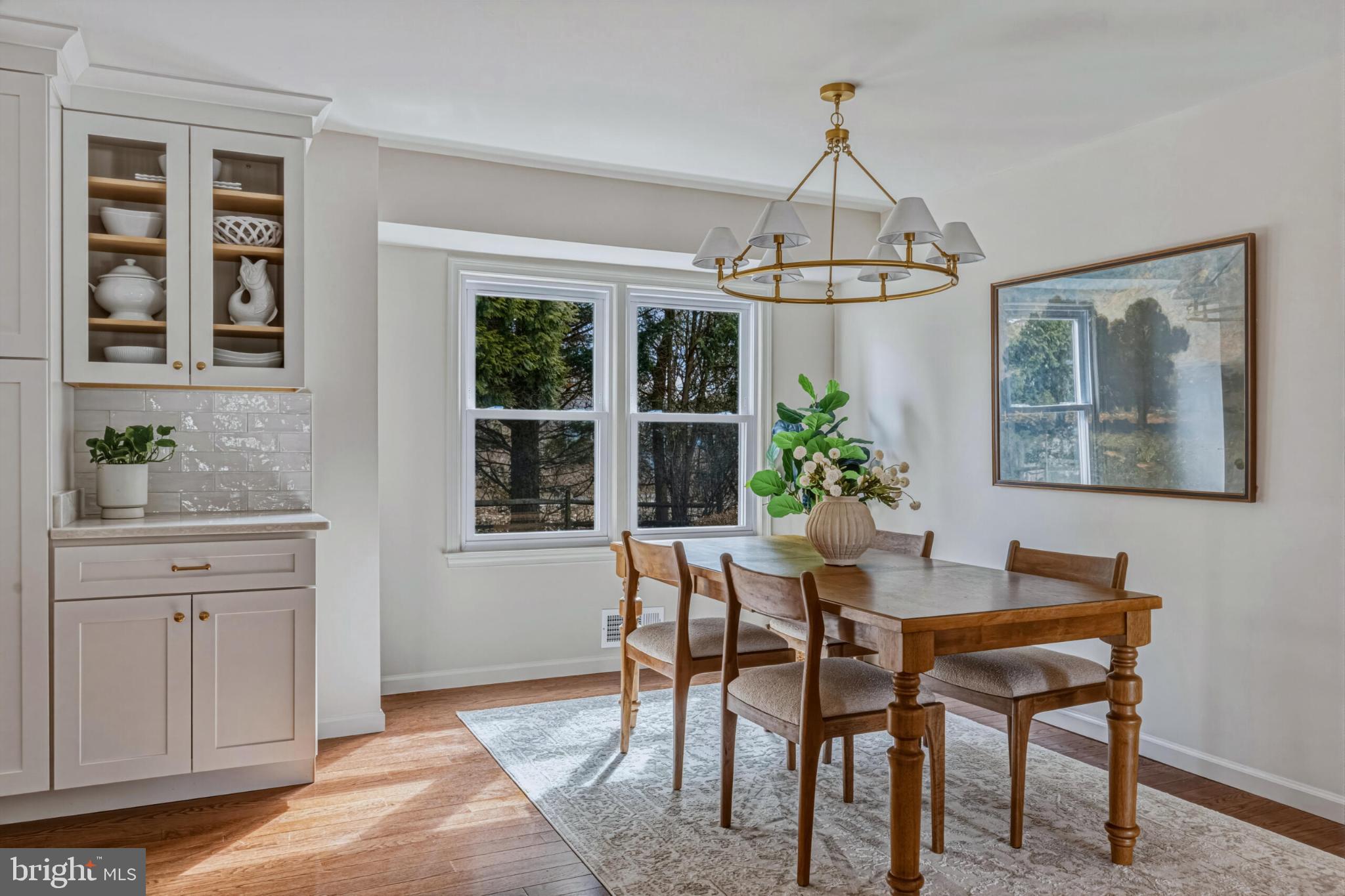 1331 Deep Run Lane Reston, VA 20190 - Photo 15 of 51 a dining room with furniture a chandelier and window