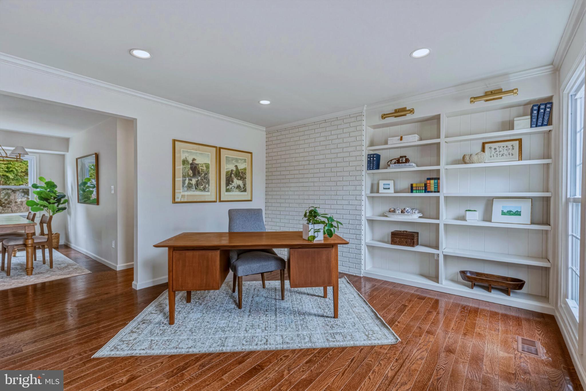 1331 Deep Run Lane Reston, VA 20190 - Photo 18 of 51 a living room with furniture a rug and a wooden floor
