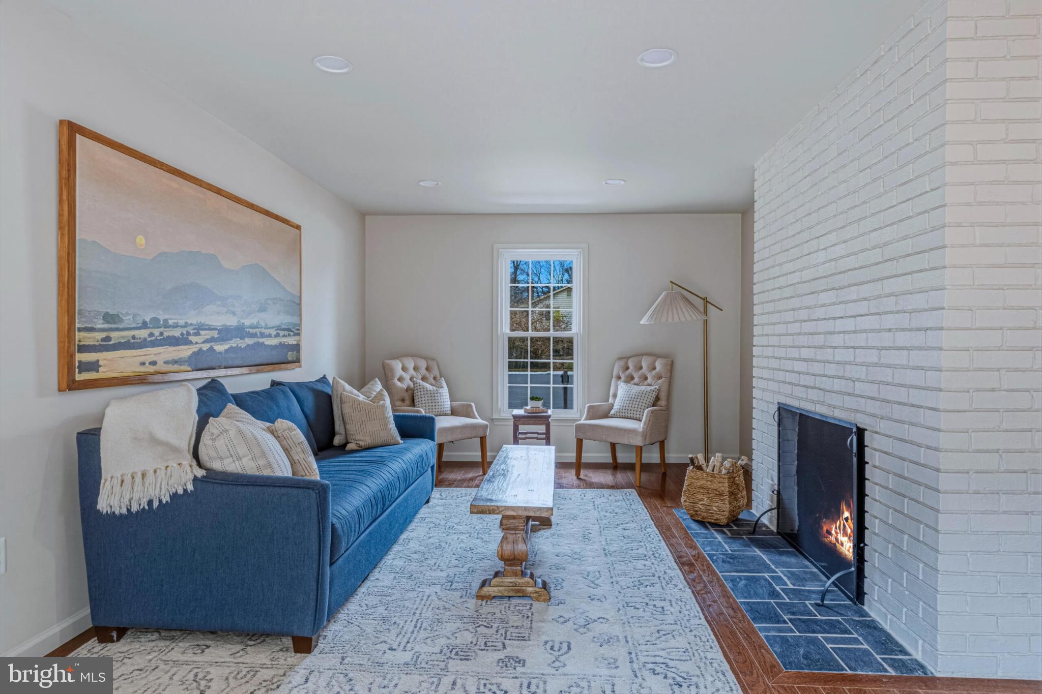 1331 Deep Run Lane Reston, VA 20190 - Photo 21 of 51 a living room with furniture and a fireplace