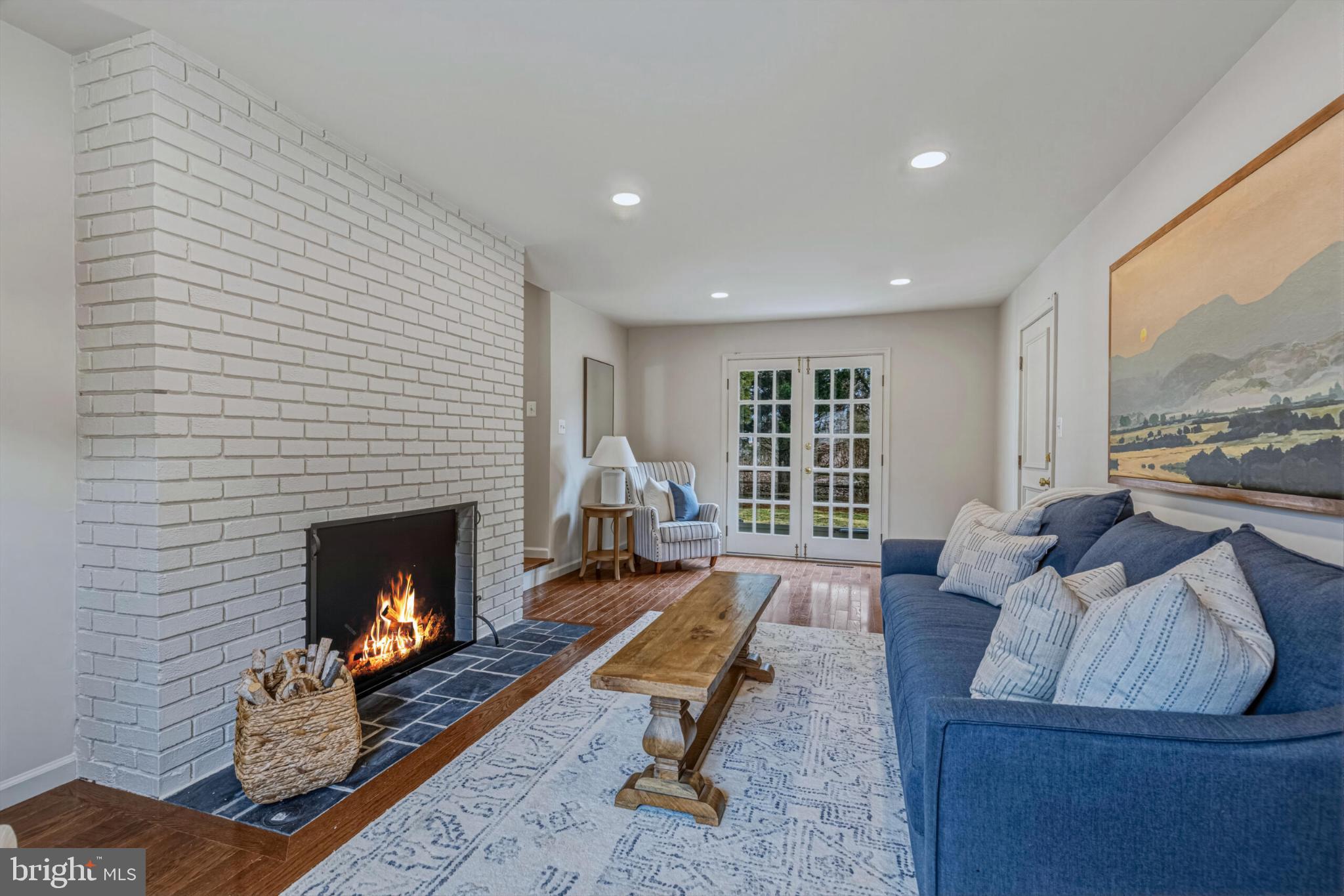 1331 Deep Run Lane Reston, VA 20190 - Photo 22 of 51 a living room with furniture and a fireplace