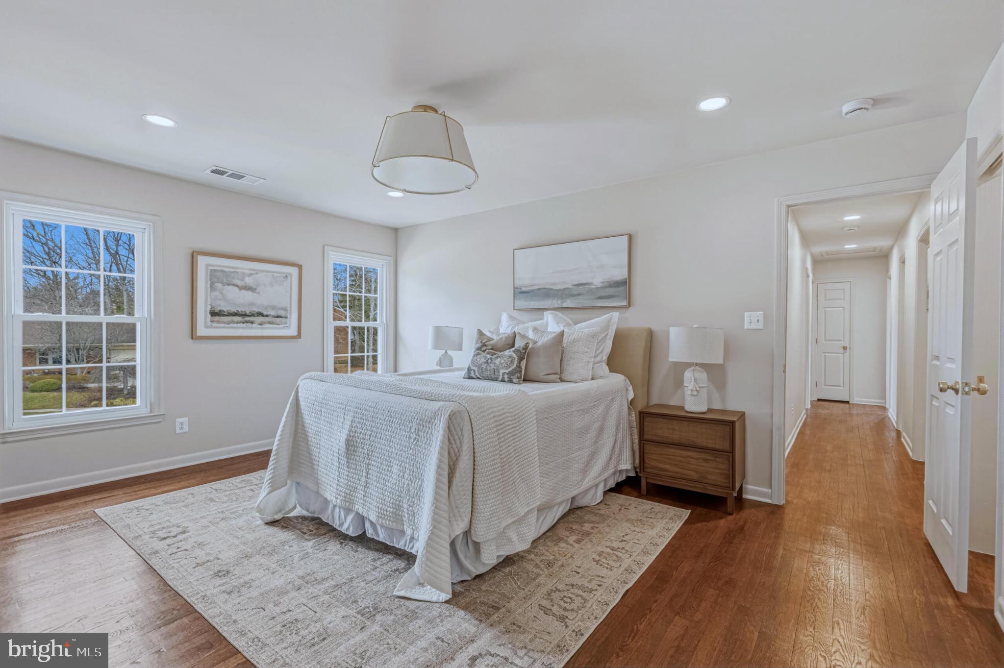 1331 Deep Run Lane Reston, VA 20190 - Photo 25 of 51 a spacious bedroom with a bed and a table in it