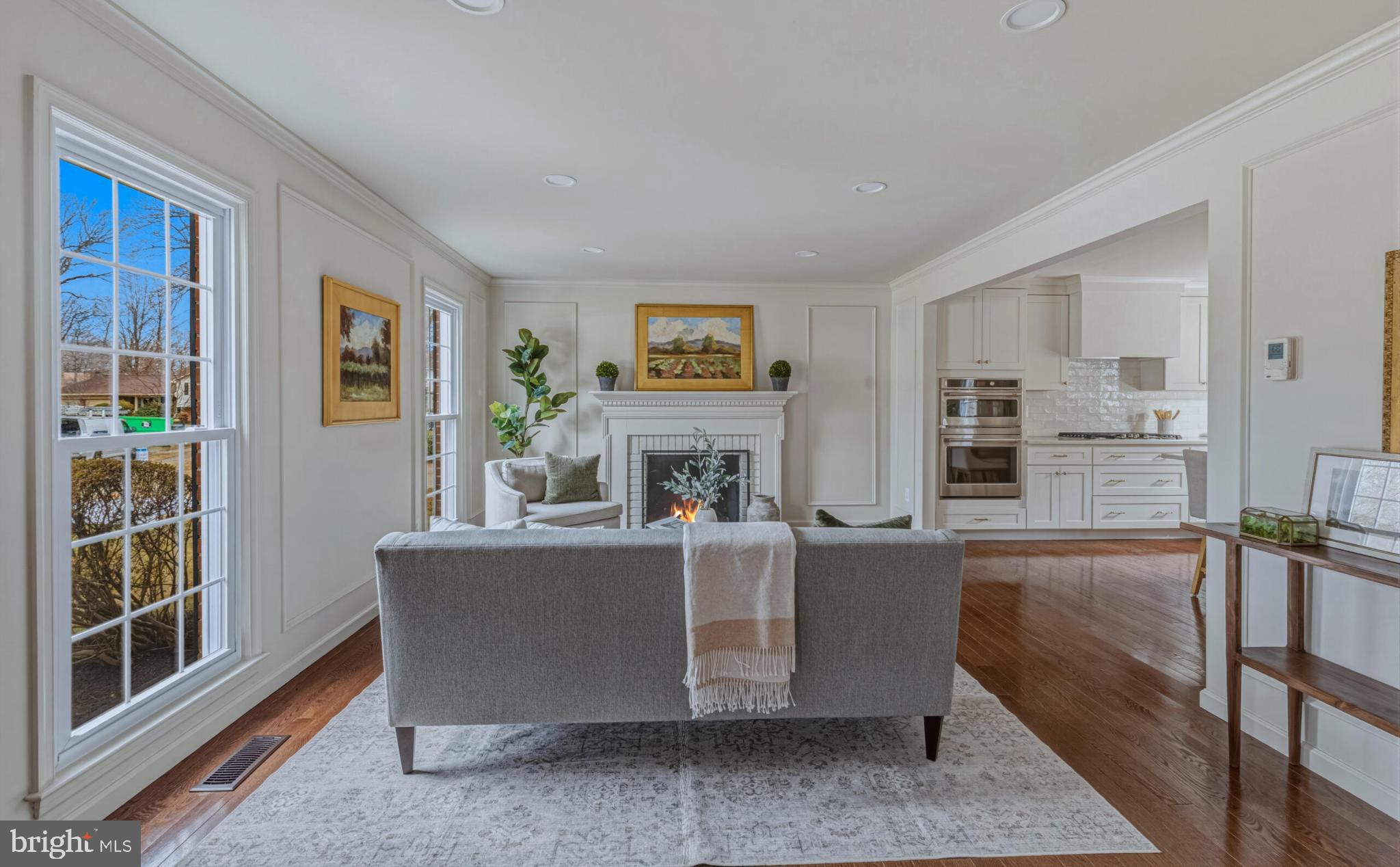 1331 Deep Run Lane Reston, VA 20190 - Photo 3 of 51 a living room with fireplace furniture and a table