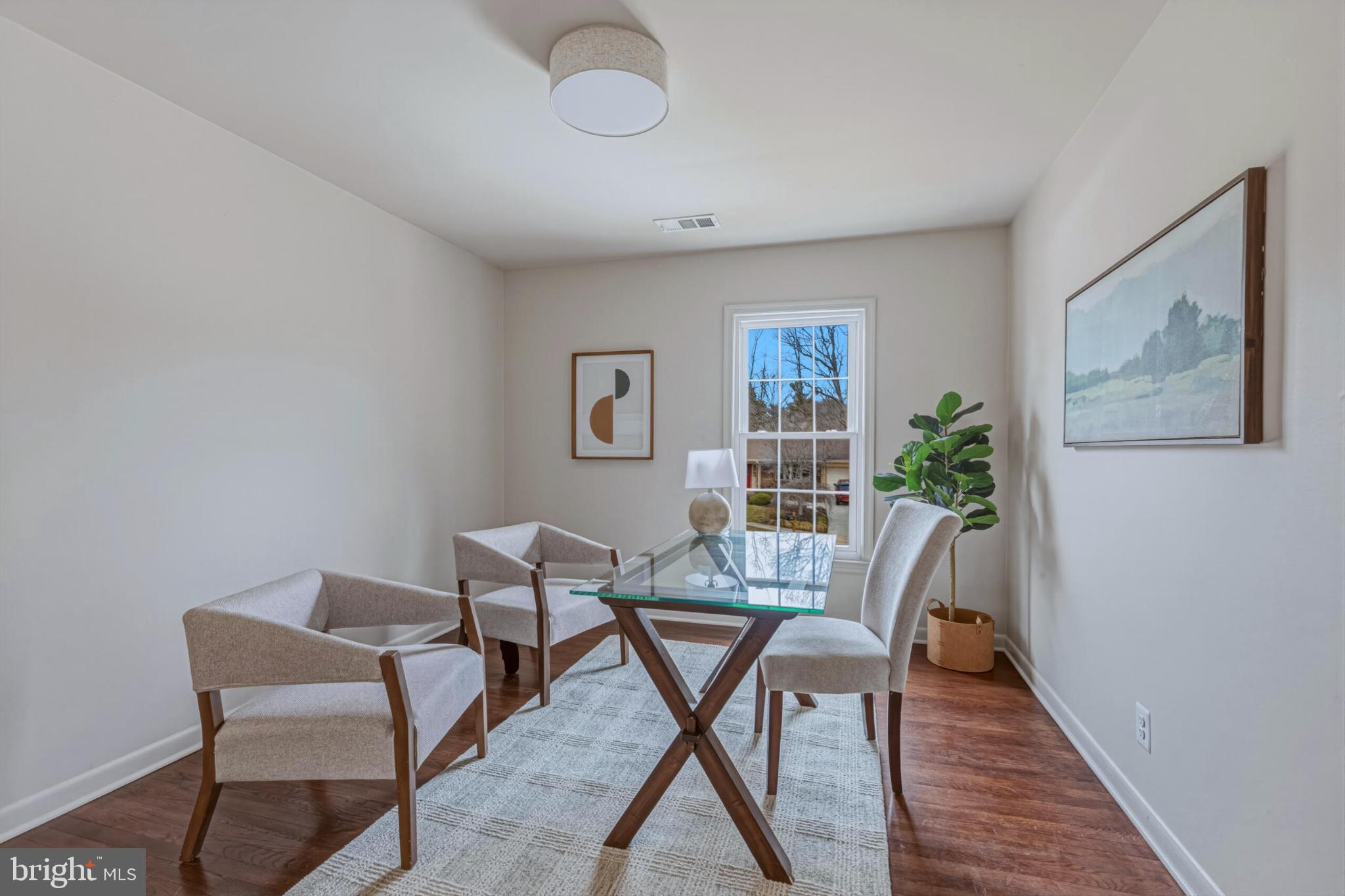 1331 Deep Run Lane Reston, VA 20190 - Photo 32 of 51 a view of a livingroom with furniture and wooden floor