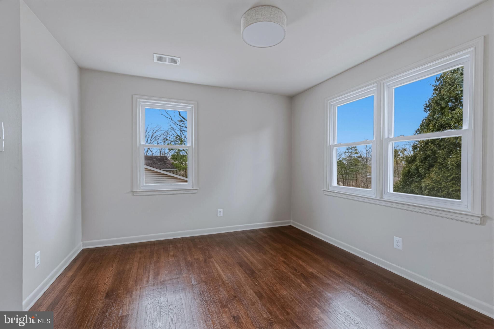 1331 Deep Run Lane Reston, VA 20190 - Photo 34 of 51 a view of empty room with window and wooden floor