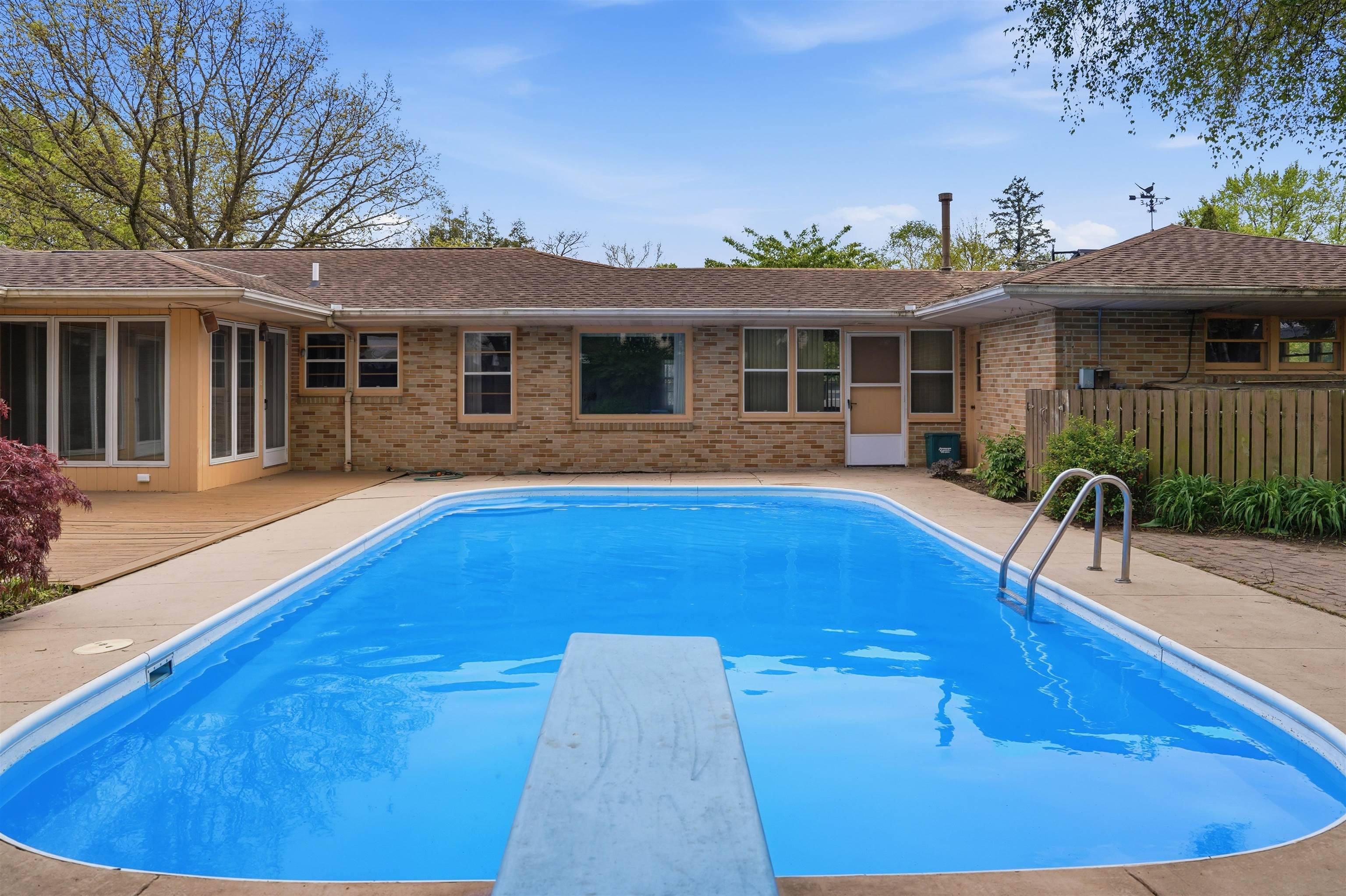 1213 Douglas Terrace Dixon, IL 61021 - Photo 45 of 49 a view of a house with swimming pool and porch