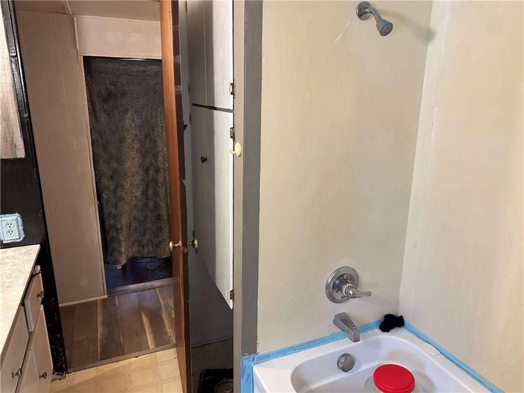 198 Sweetwater Trail Villa Rica, GA 30180 - Photo 22 of 35 a bathroom with a bathtub and shower