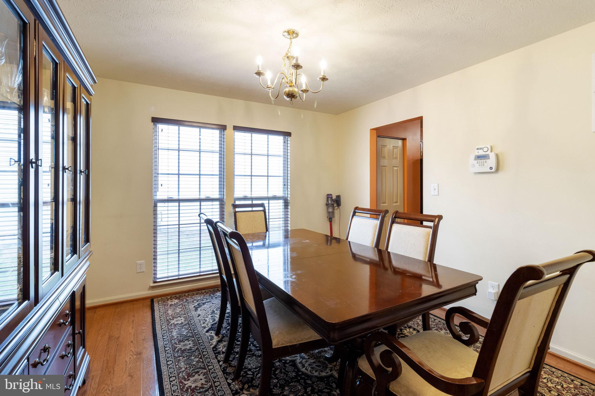 7751 Rotherham Drive Hanover, MD 21076 - Photo 18 of 42 Formal Dining Room w/ Hardwood