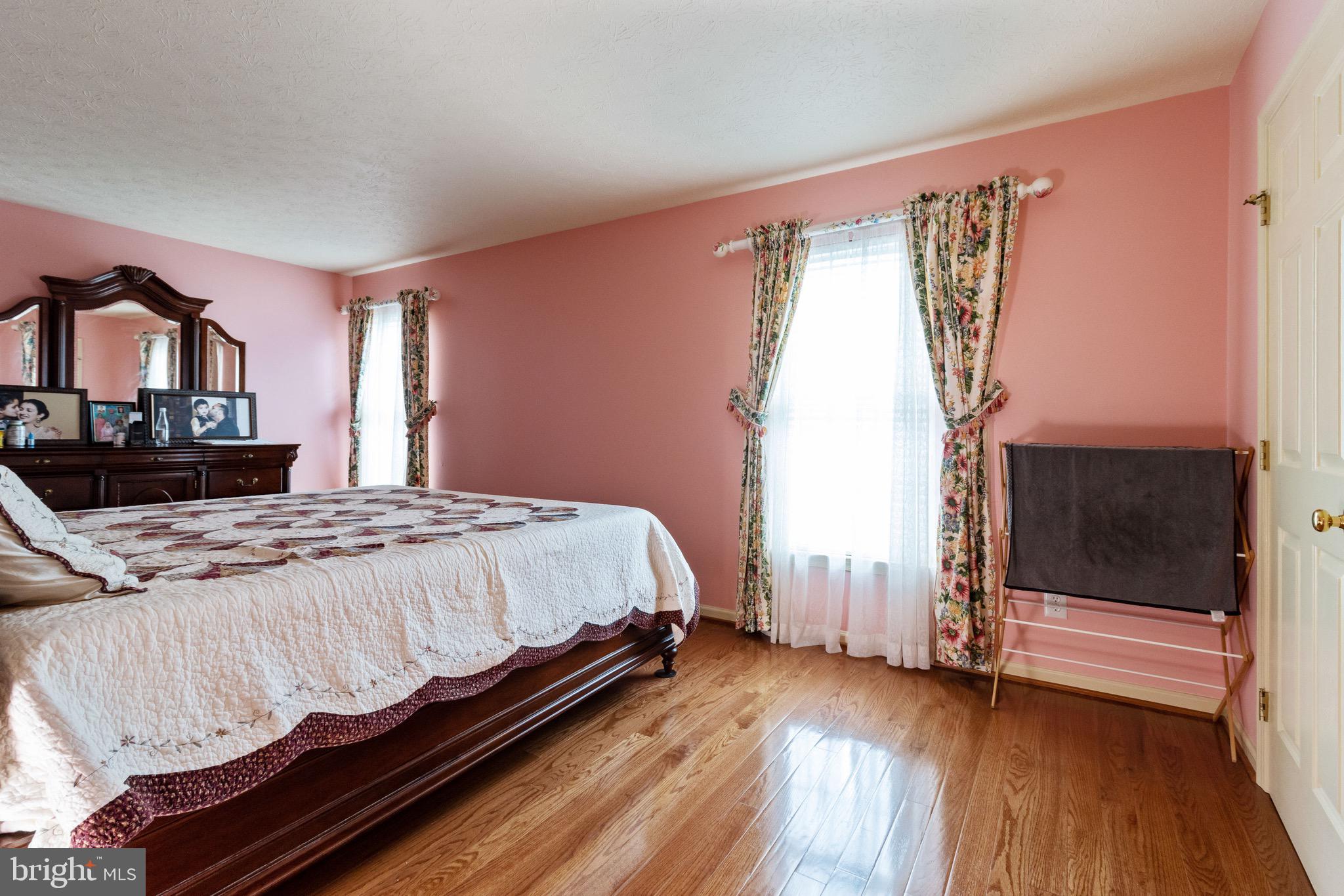 7751 Rotherham Drive Hanover, MD 21076 - Photo 21 of 42 Primary Bedroom w/ Hardwood Floors