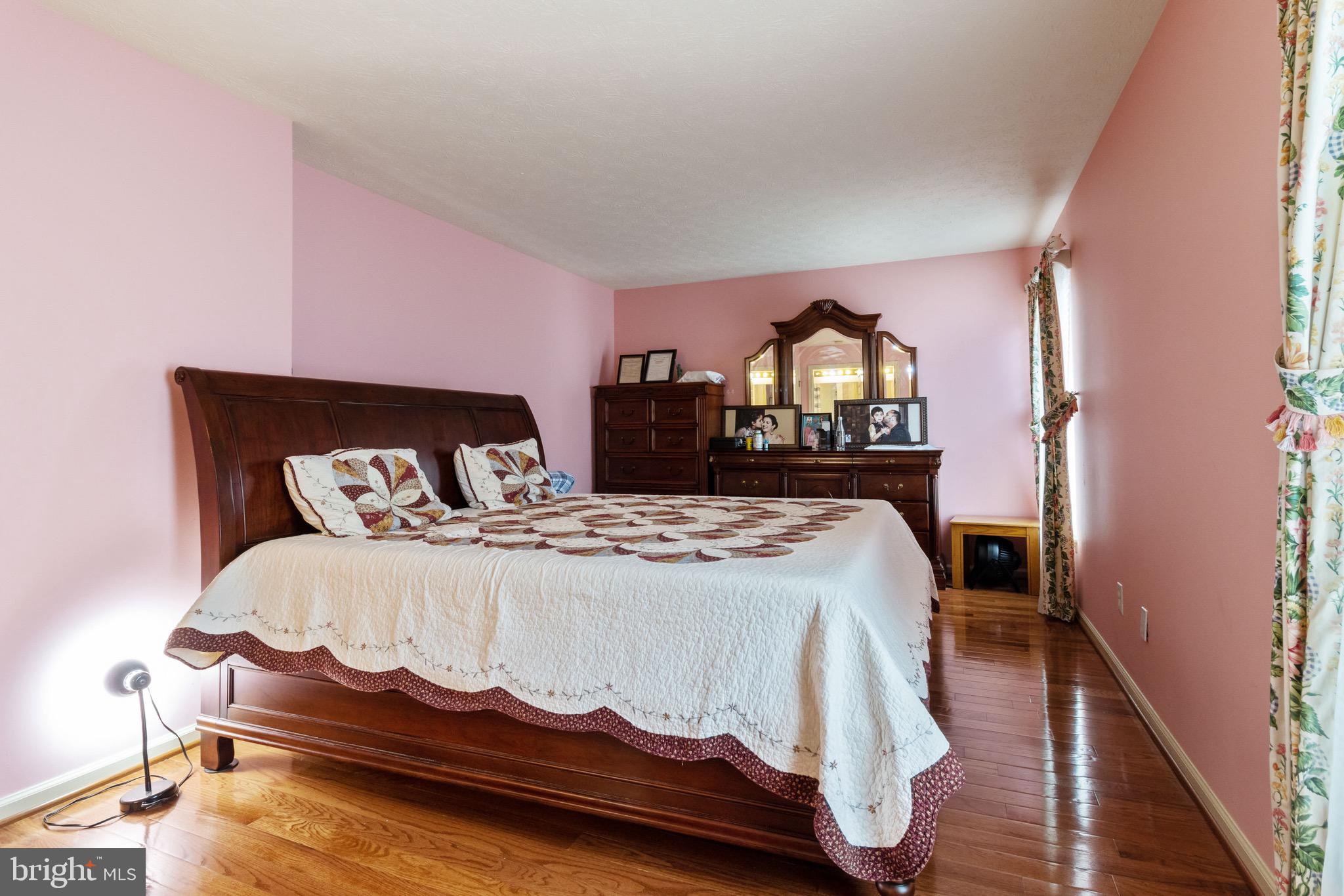7751 Rotherham Drive Hanover, MD 21076 - Photo 22 of 42 Primary Bedroom w/ Hardwood Floors