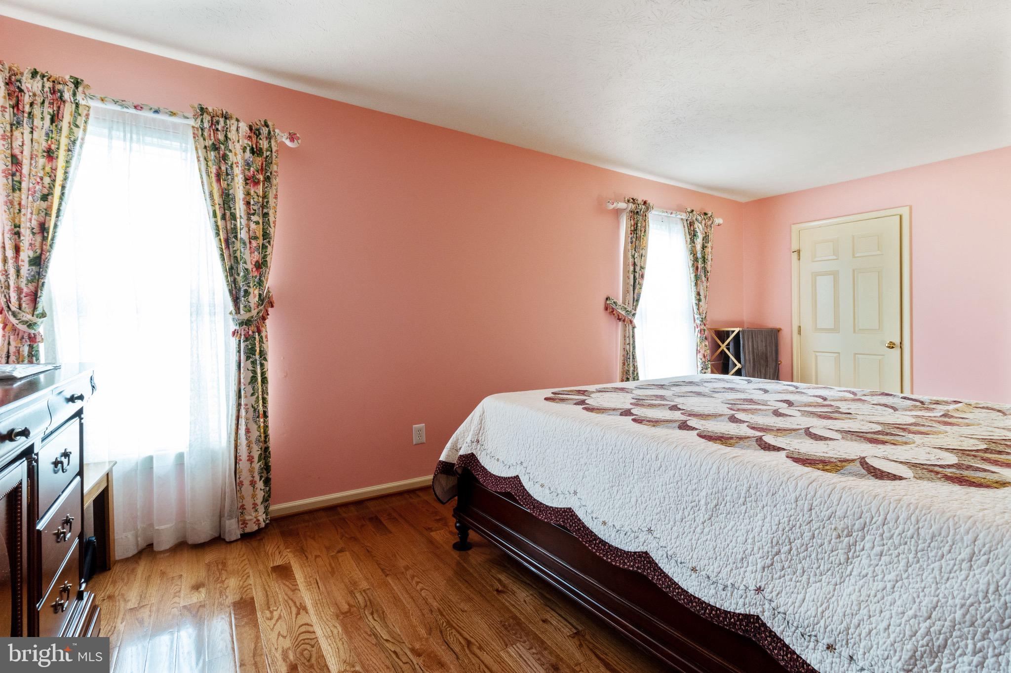7751 Rotherham Drive Hanover, MD 21076 - Photo 23 of 42 Primary Bedroom w/ Hardwood Floors