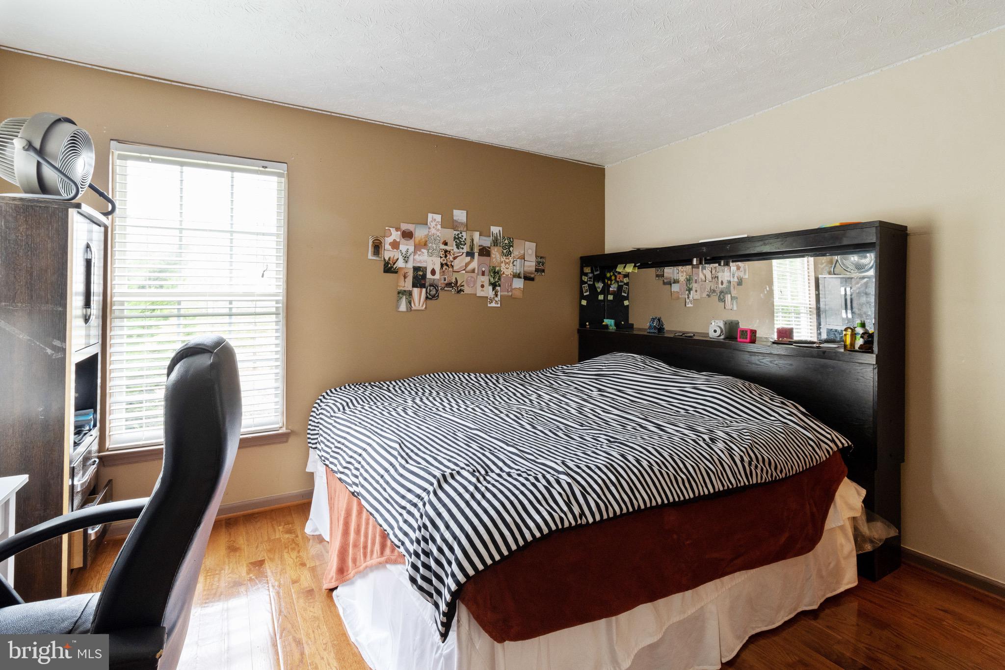 7751 Rotherham Drive Hanover, MD 21076 - Photo 29 of 42 Bedroom Three w/ Hardwood Floors