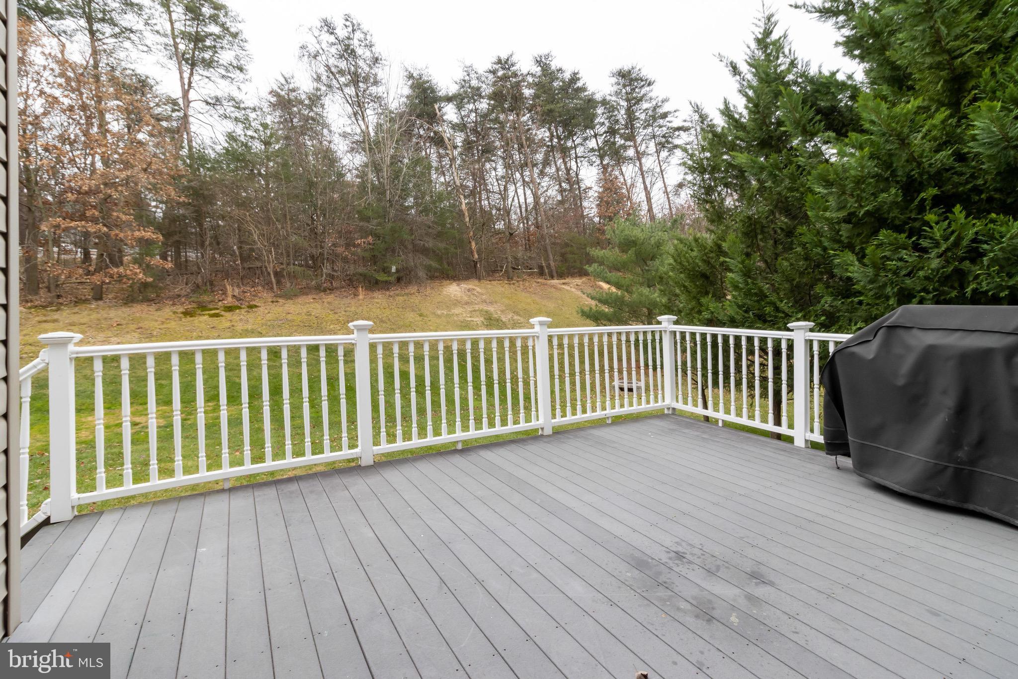 7751 Rotherham Drive Hanover, MD 21076 - Photo 38 of 42 Deck w/ Treelined Views