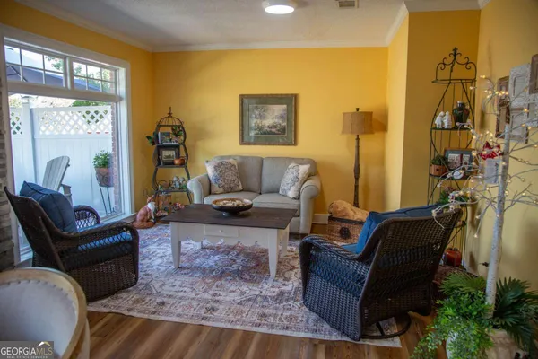 a view of fireplace and wooden floor