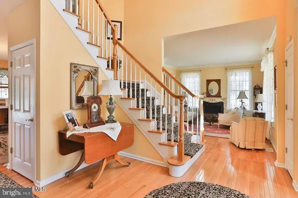 a view of a livingroom with furniture and wooden floor
