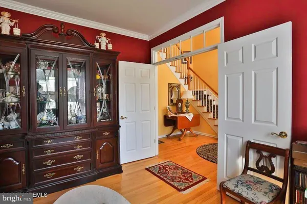 a view of living room with furniture and a window
