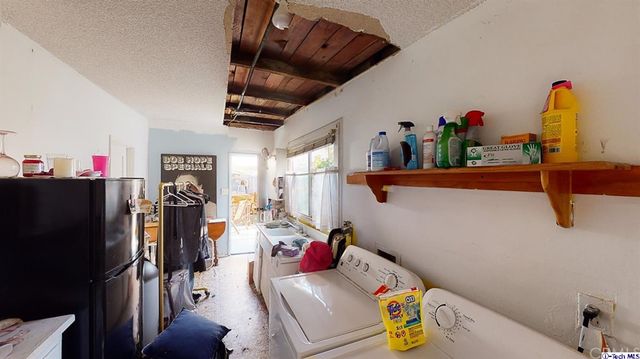 a view of storage and utility room