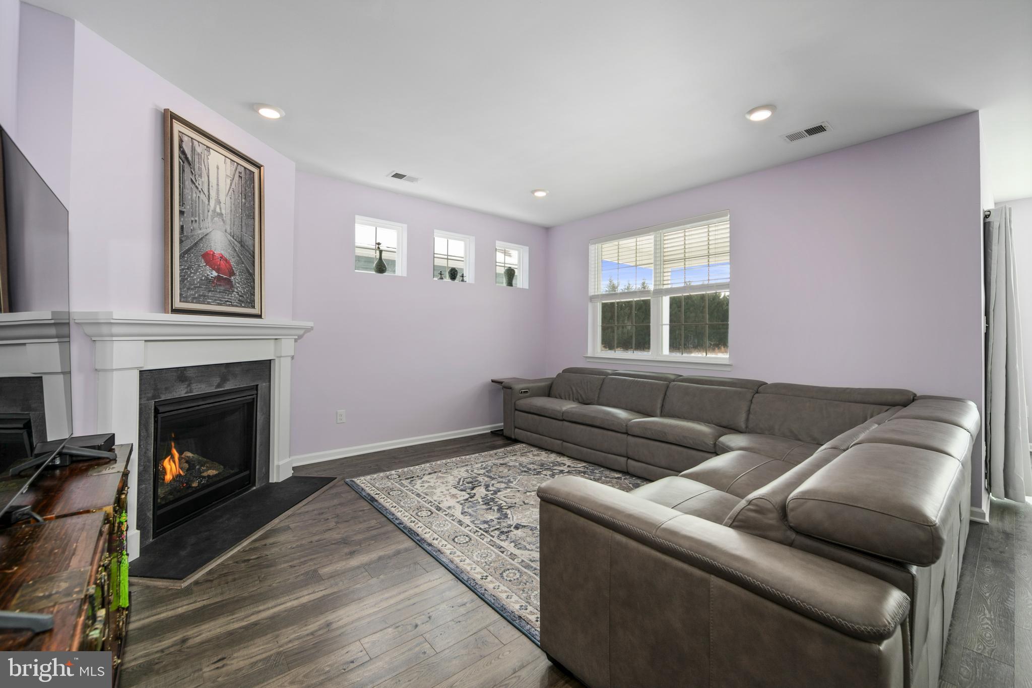 33 Walton Way Delanco, NJ 08075 - Photo 16 of 46 a living room with furniture and a fireplace