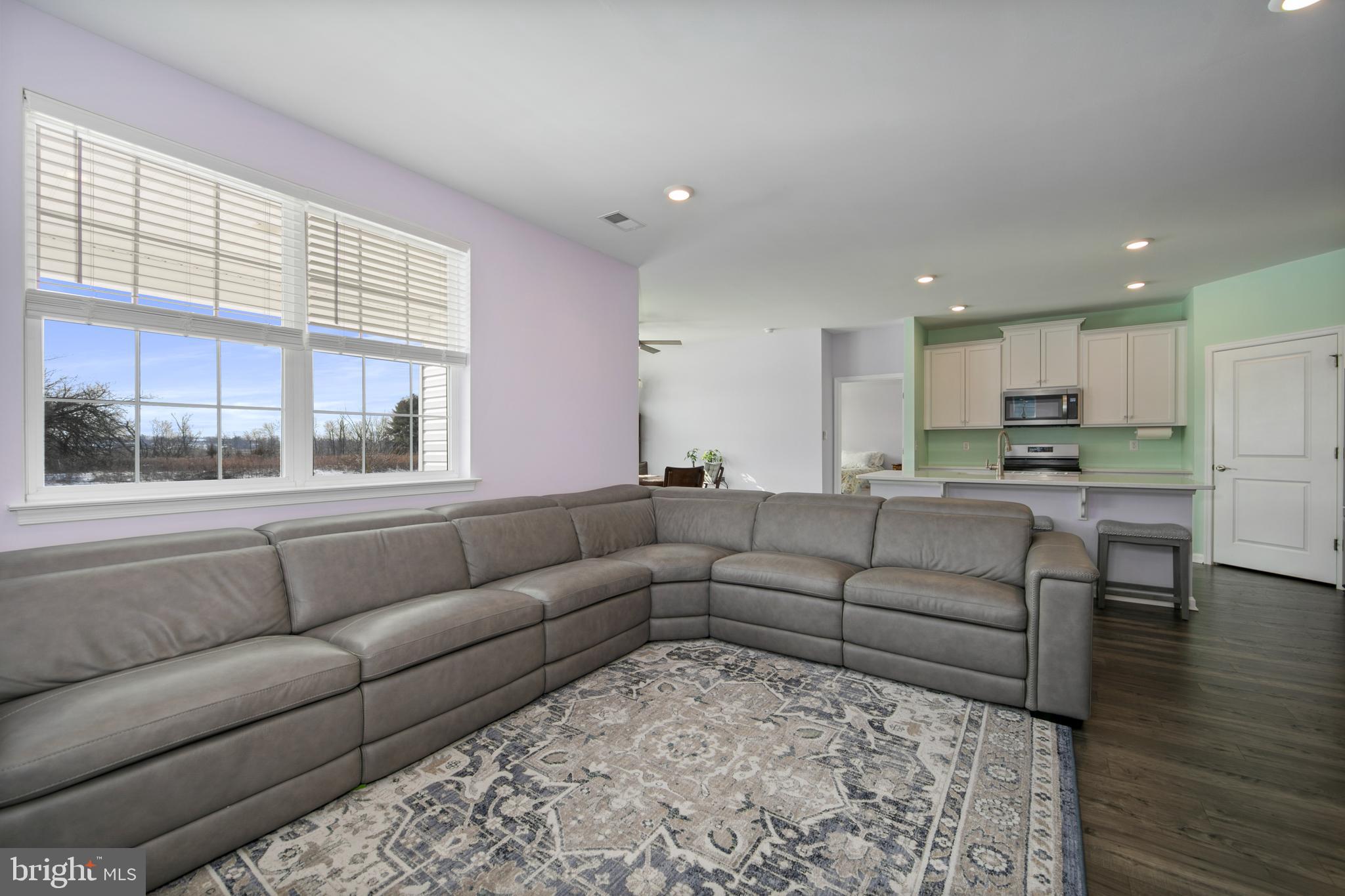 33 Walton Way Delanco, NJ 08075 - Photo 17 of 46 a living room with furniture and a large window