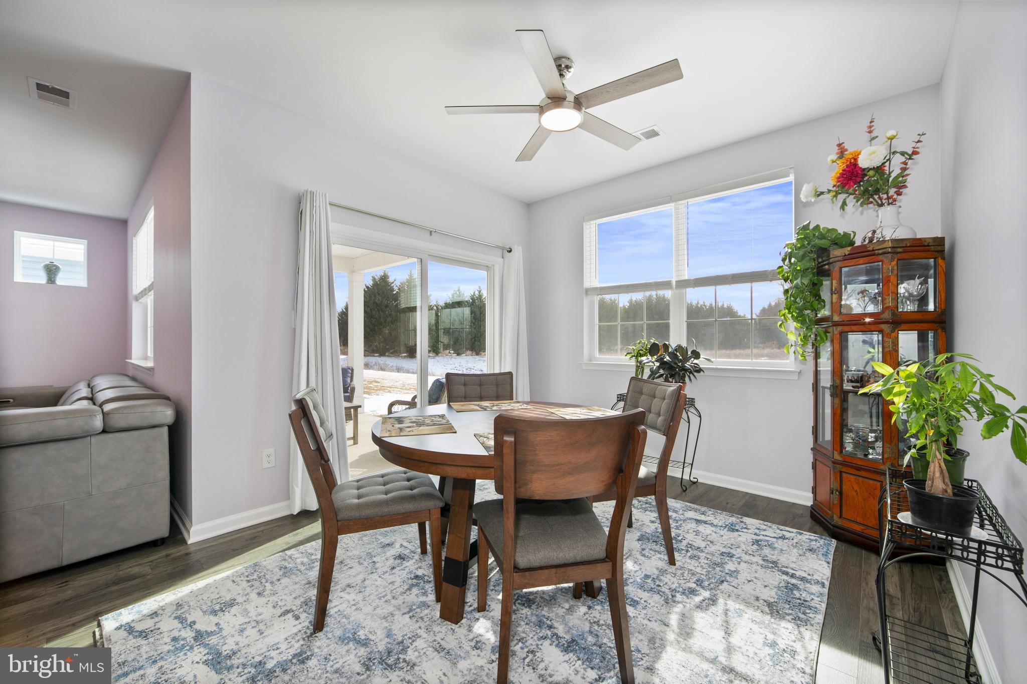 33 Walton Way Delanco, NJ 08075 - Photo 21 of 46 a dining room with furniture potted plants and wooden floor