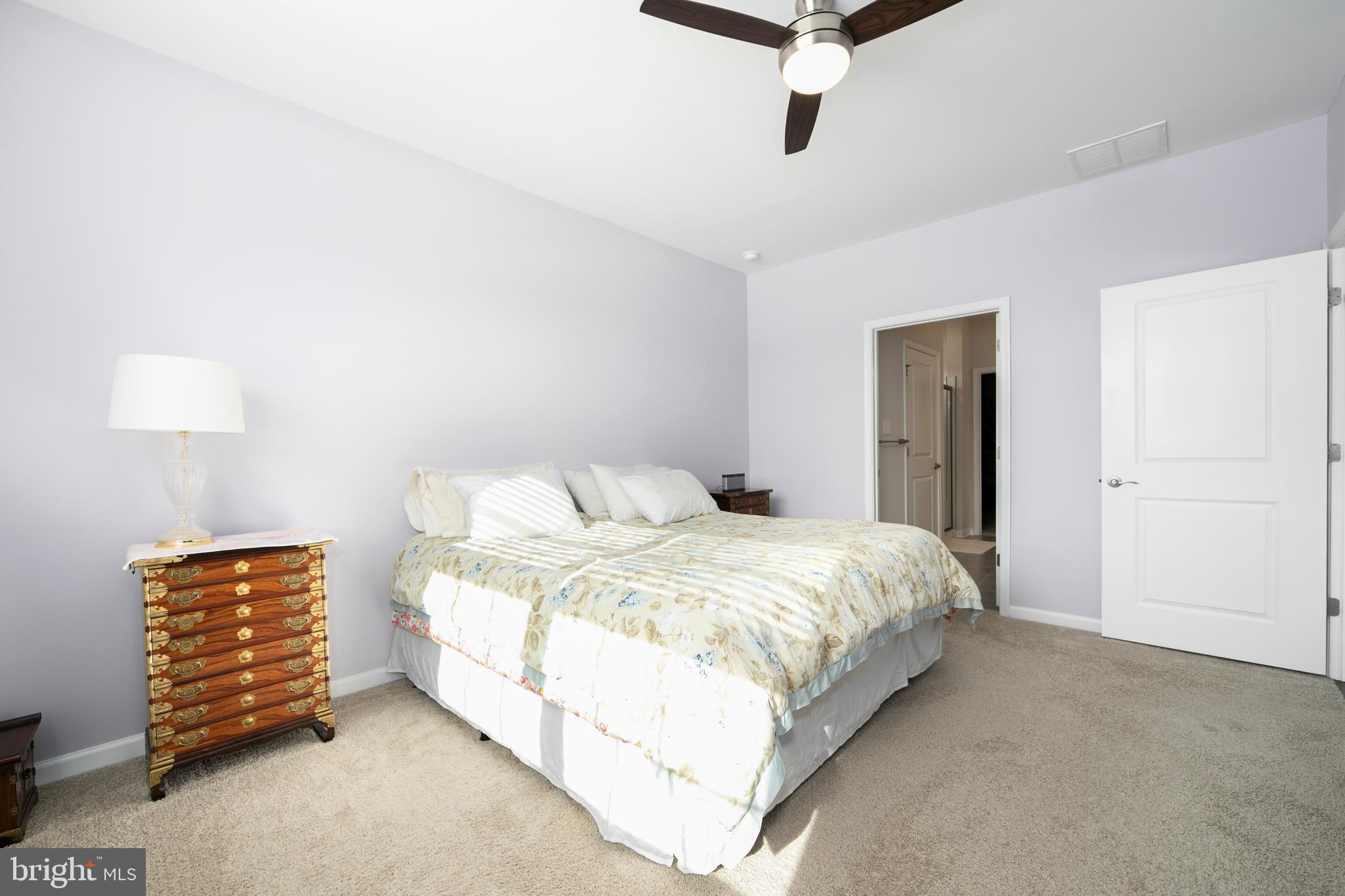 33 Walton Way Delanco, NJ 08075 - Photo 23 of 46 a spacious bedroom with a bed and a window