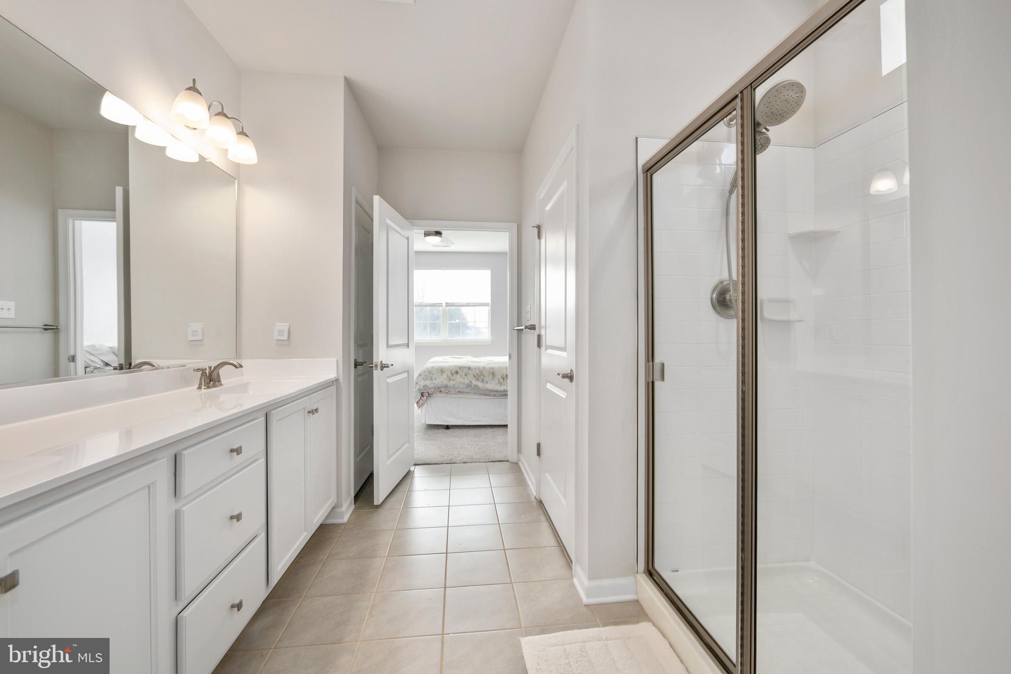 33 Walton Way Delanco, NJ 08075 - Photo 26 of 46 a bathroom with a double vanity sink and mirror with shower