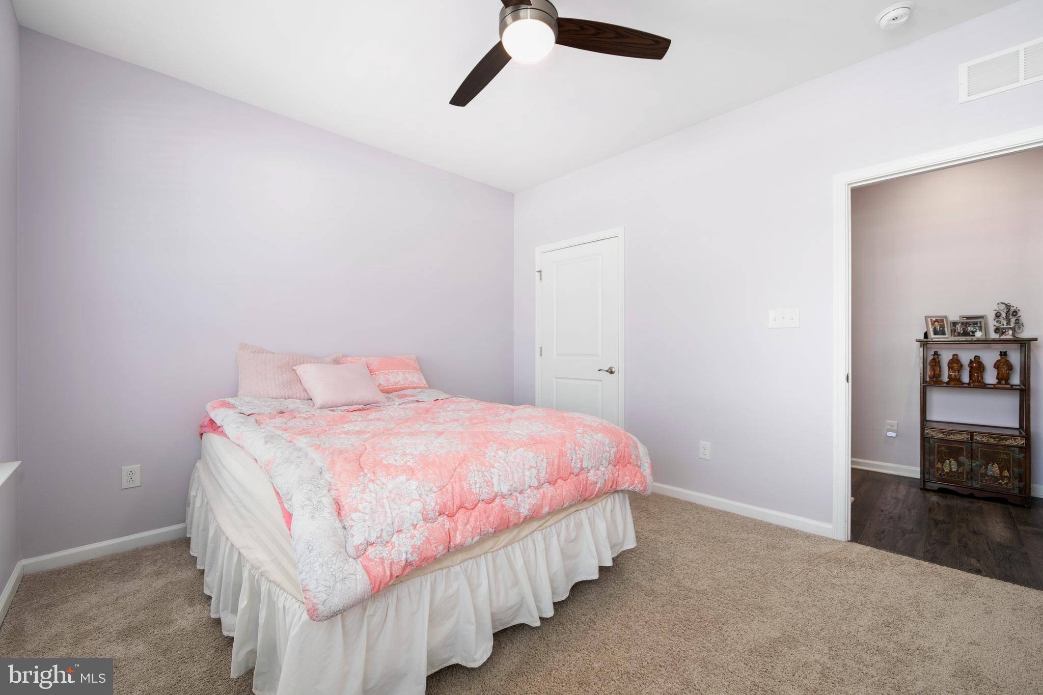 33 Walton Way Delanco, NJ 08075 - Photo 29 of 46 a bedroom with bed and a chandelier