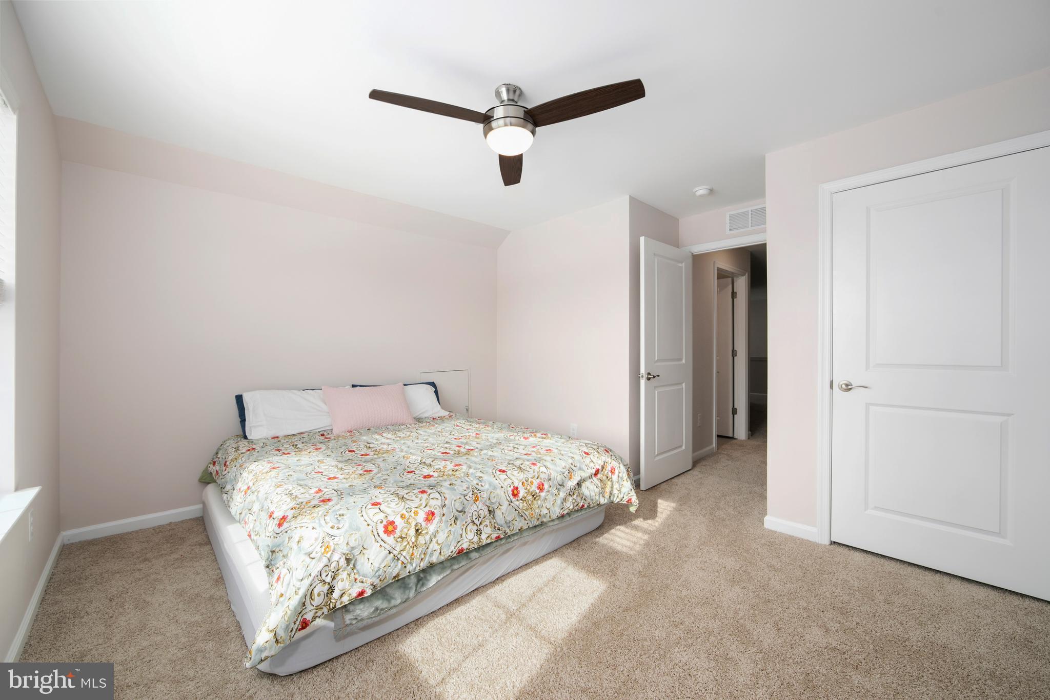 33 Walton Way Delanco, NJ 08075 - Photo 37 of 46 a bedroom with a bed and a ceiling fan