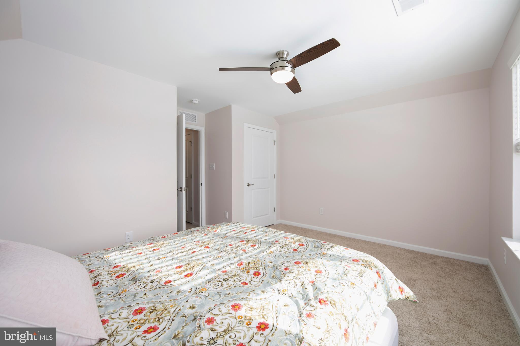 33 Walton Way Delanco, NJ 08075 - Photo 38 of 46 a bedroom with a bed and a window