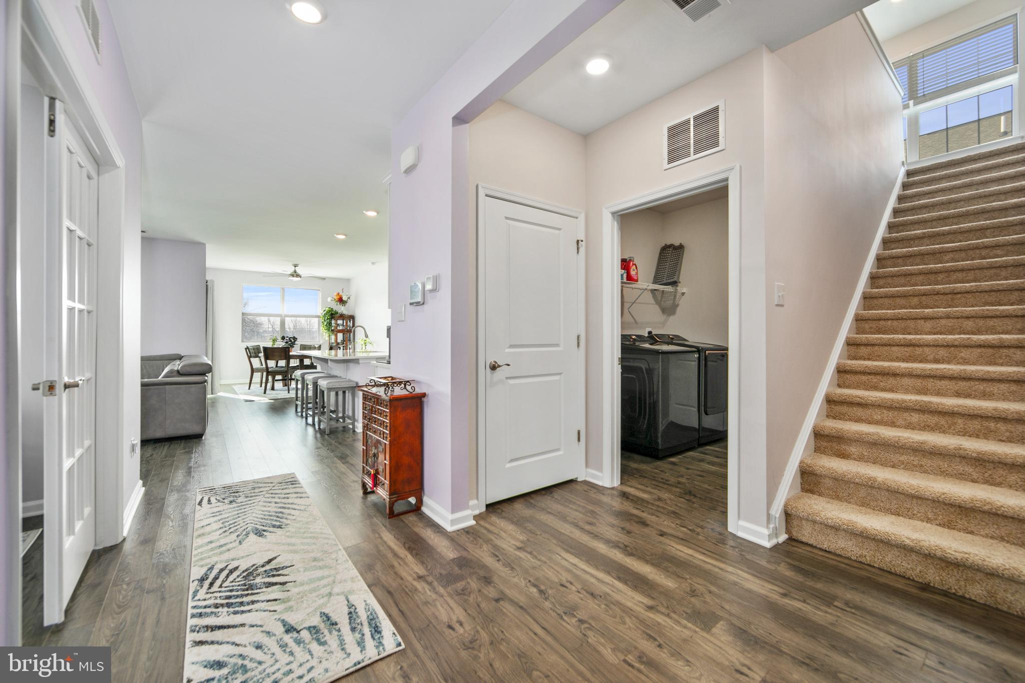 33 Walton Way Delanco, NJ 08075 - Photo 8 of 46 a view of a hallway view with wooden floor and staircase