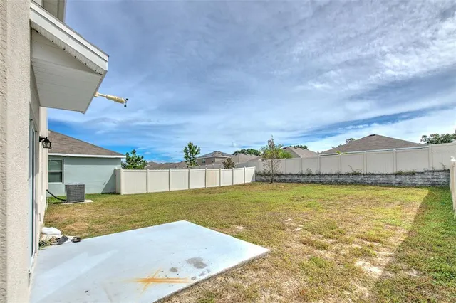 a view of an swimming pool and an outdoor space