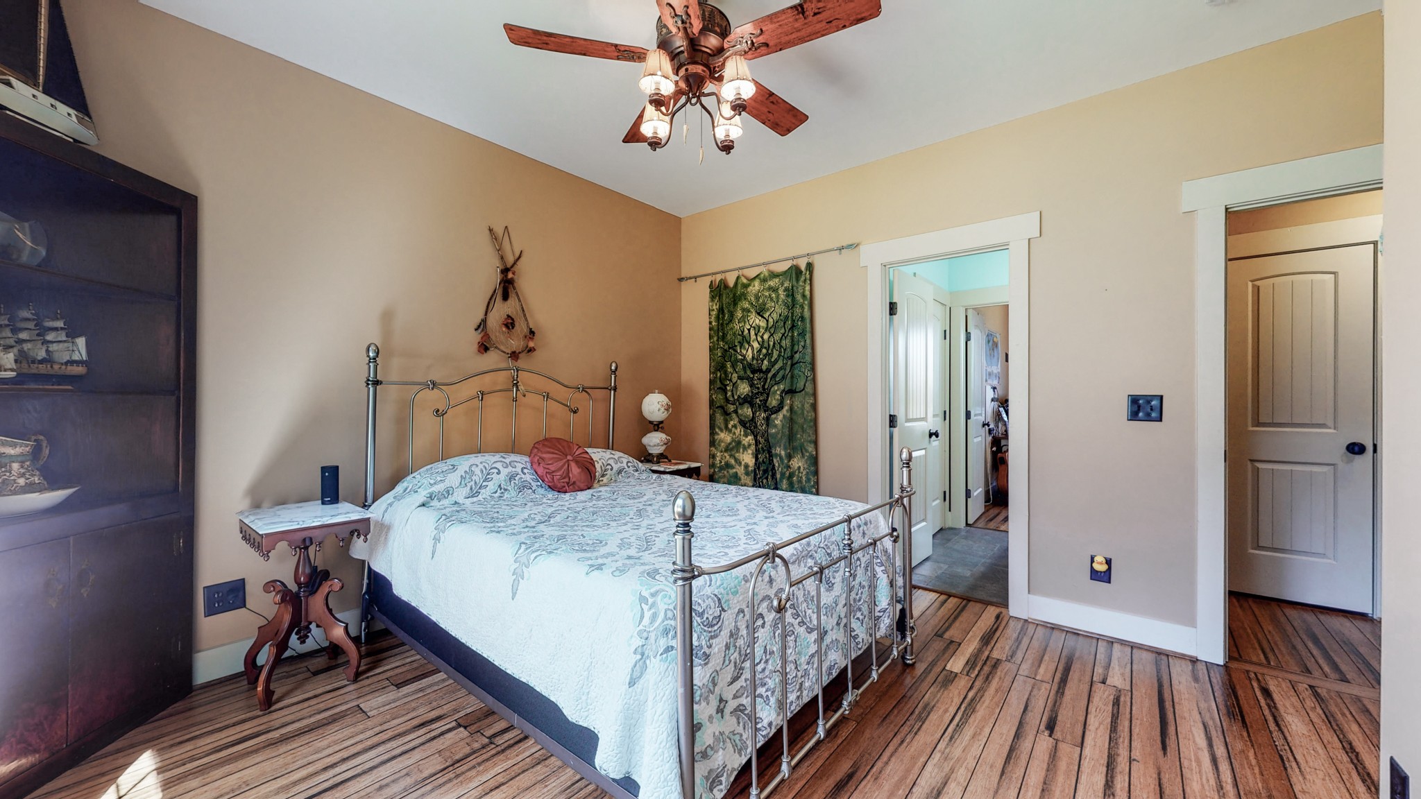4290 Beech Log Road Lebanon, TN 37090 - Photo 22 of 34 a bedroom with a bed and wooden floor