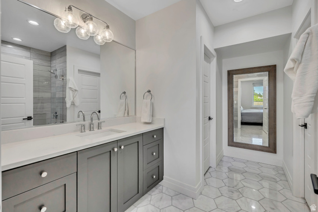 1720 Hillcrest Circle Mapleton, UT 84664 - Photo 77 of 116 Full bathroom featuring vanity, ensuite bathroom, tiled shower, and recessed lighting