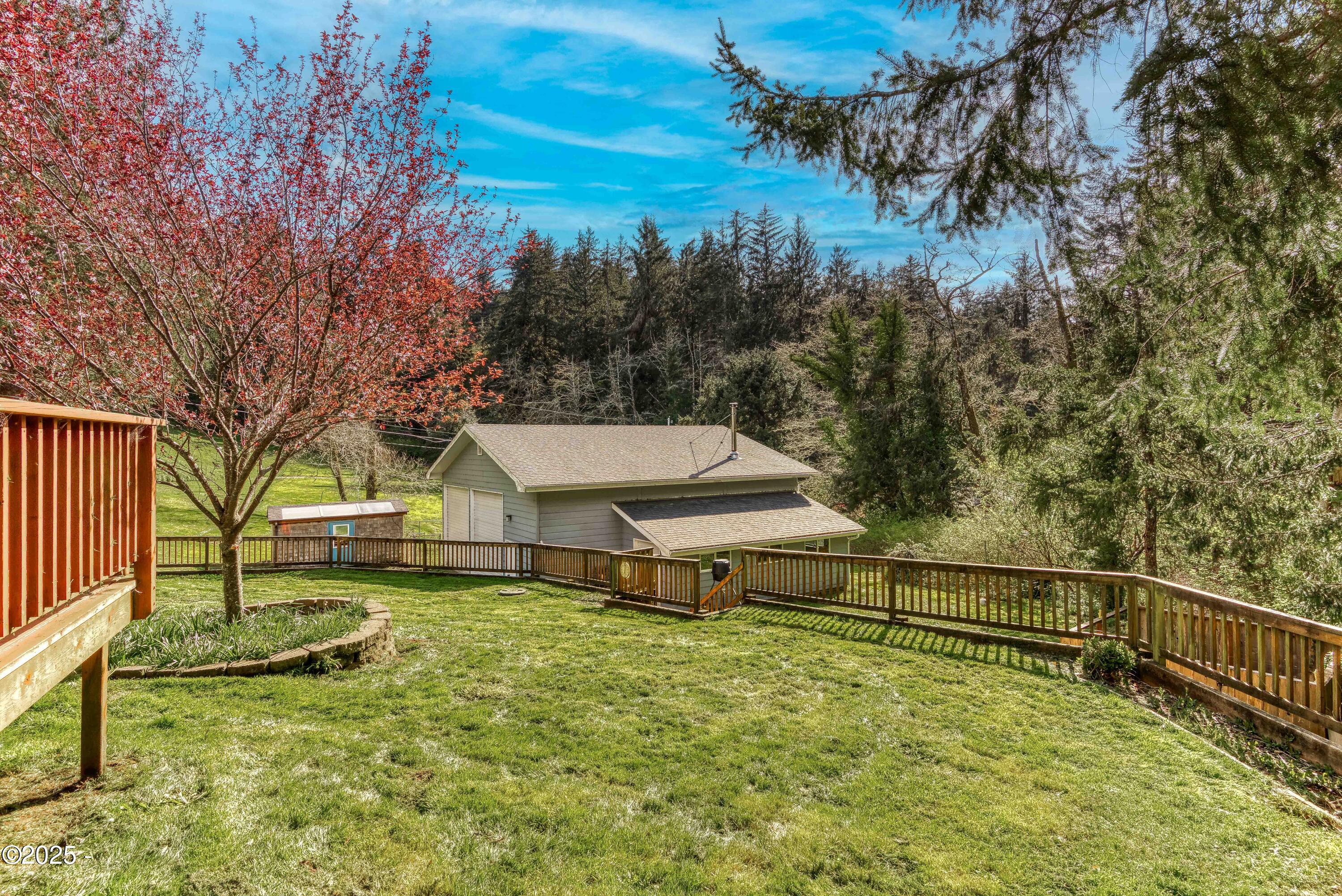 312 Southeast Davis Road Newport, OR 97365 - Photo 17 of 30 Fenced back yard facing the shop