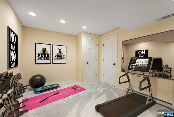 a bedroom with a bed and a chair