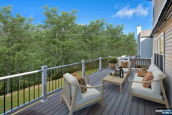 a view of a roof deck with couches