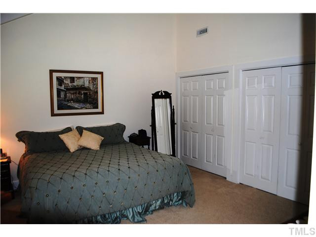 1505 Farmington Court Raleigh, NC 27615 - Photo 22 of 25 This huge master bedroom offers plenty of closet space, raised ceiling and thick, plush carpet. A very private and quiet room, this master suite can accomodate a king bedroom suite with ease. Master Bedroom