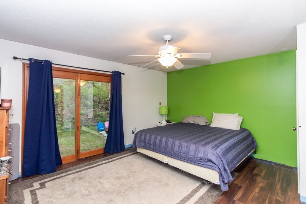 34 Union Road Holland, MA 01521 - Photo 19 of 29 a bedroom with a bed and a window