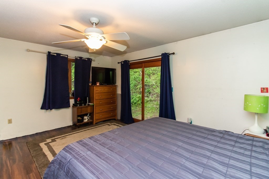 34 Union Road Holland, MA 01521 - Photo 20 of 29 a bedroom with a bed and a window