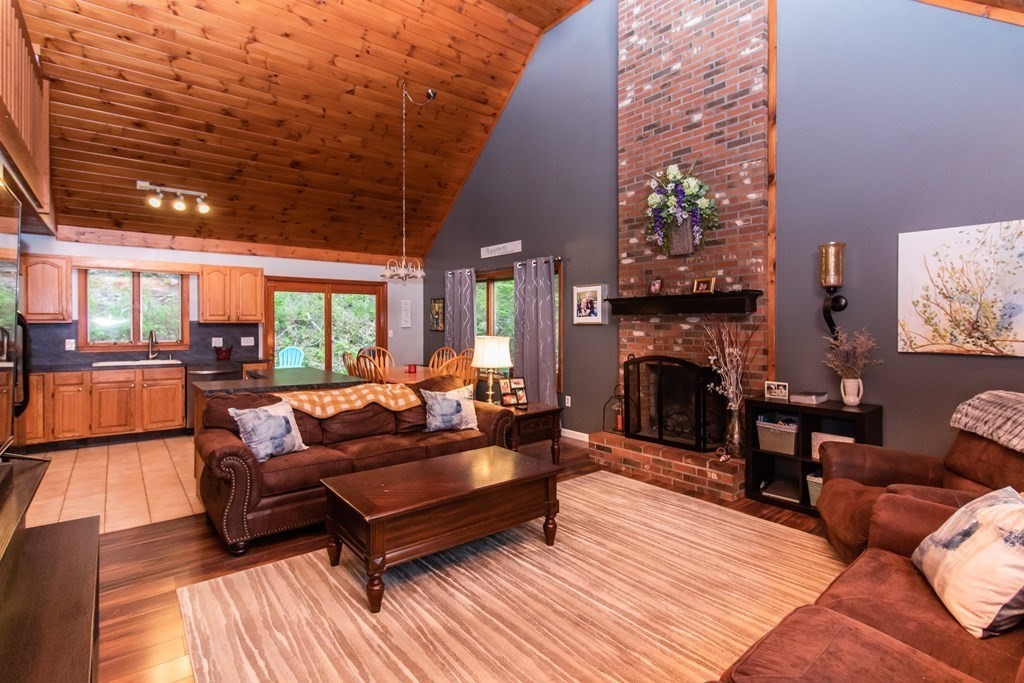 34 Union Road Holland, MA 01521 - Photo 6 of 29 a outdoor living space with furniture and a fireplace