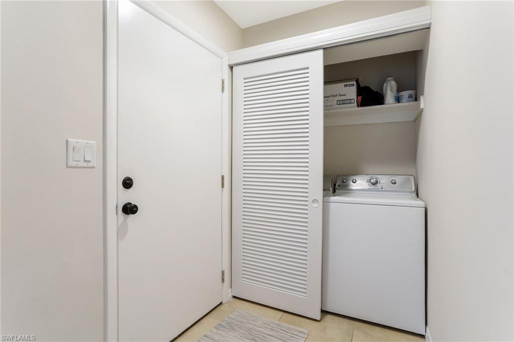 1340 Crayton Road, Unit 4 Naples, FL 34102 - Photo 16 of 20 a utility room with dryer and washer